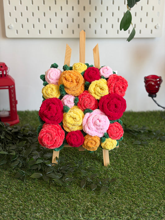 Tableau floral avec bouquet de roses colorées, peinture Nuiba représentant un arrangement élégant de fleurs dans un cadre.