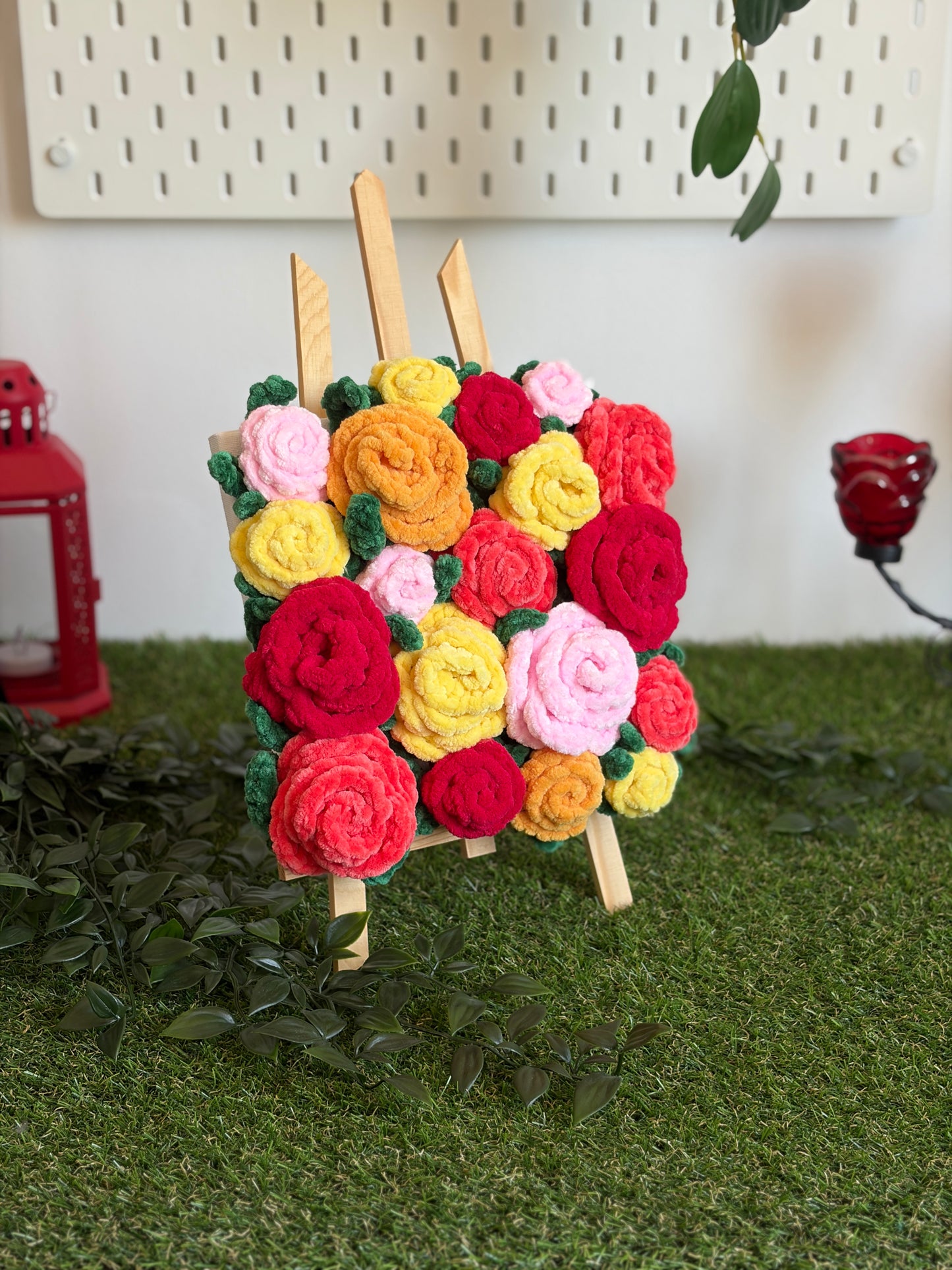Tableau floral représentant un bouquet de roses colorées, signé Nuiba, peinture artistique pour décoration intérieure.
