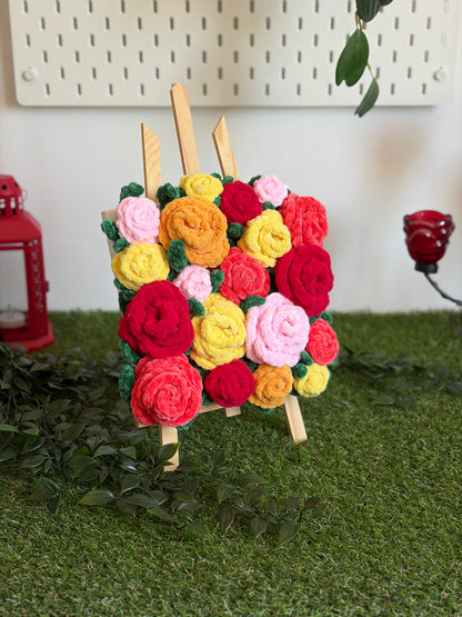 Tableau floral représentant un bouquet de roses colorées, signé Nuiba, peinture artistique pour décoration intérieure.