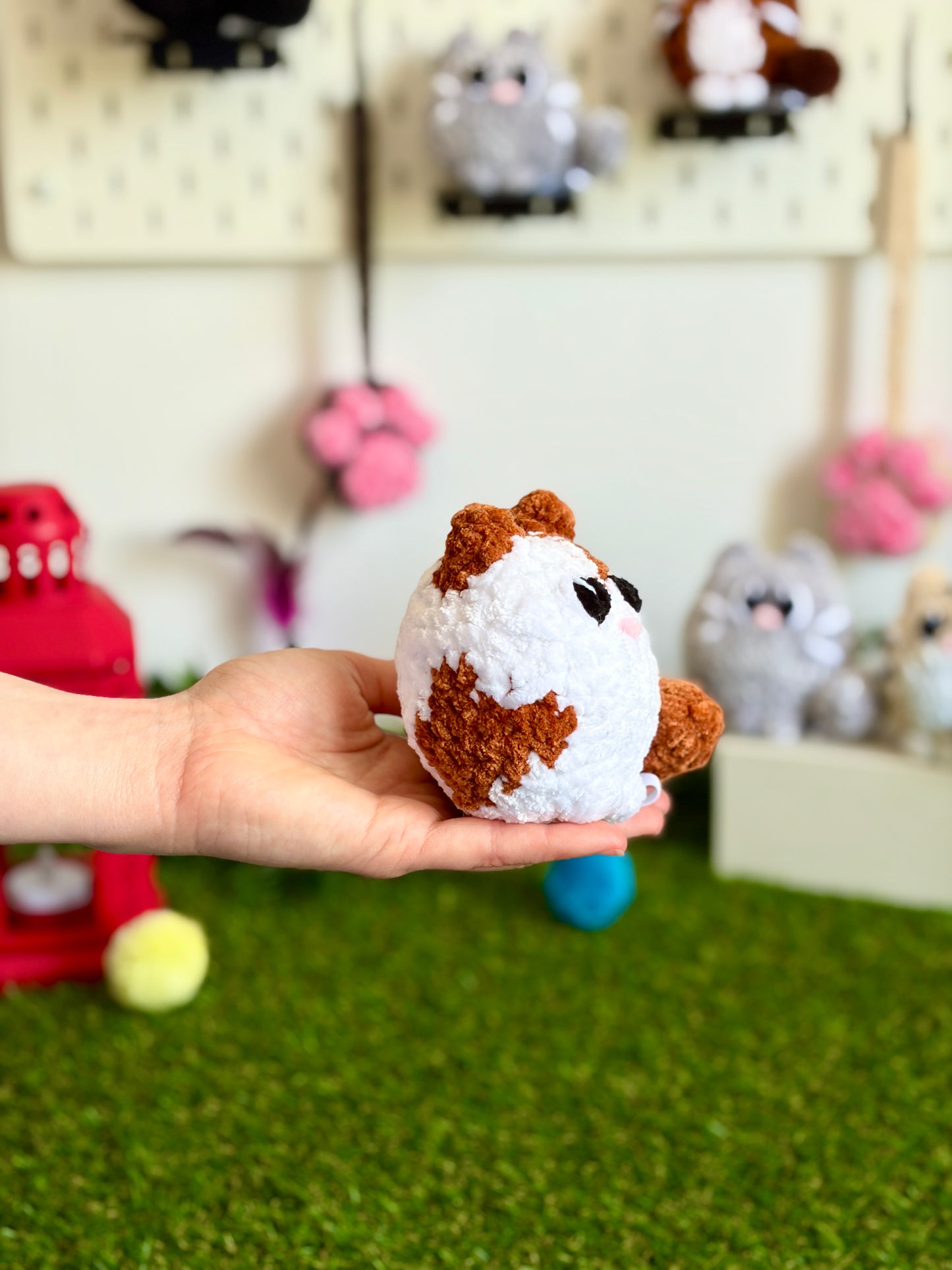 Chat Flouf grand modèle de la marque Nuiba, peluche douce et câline, avec détails visibles de la tête et des pattes.